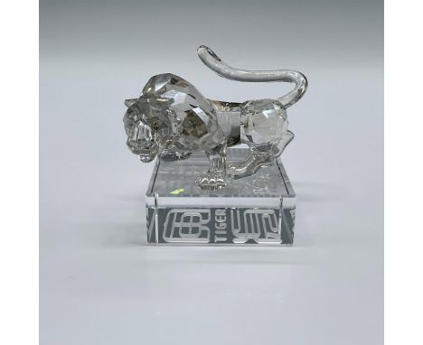 Associated with power and respect, the tiger is beautifully crafted in Silver Shade crystal with Moroda Sahara crystal eyes. 