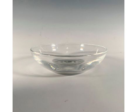 A beautifully crafted clear round bowl, featuring a sleek flat base. Marked Steuben. Dimensions: 1.5"H x 5.25" dia. Manufactu