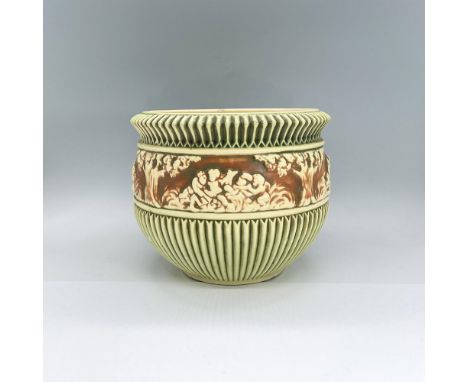 Earthenware planter in cream, green and dark orange coloration with various figures design in high-relief. Dimensions: 7.25"H