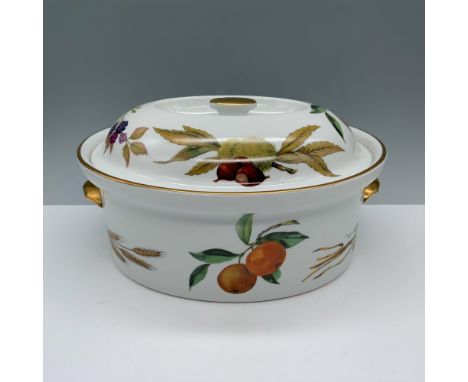 Exquisite double handled dish that is decorated with various fruits and has a matching lid. Royal Worcester backstamp. Issued
