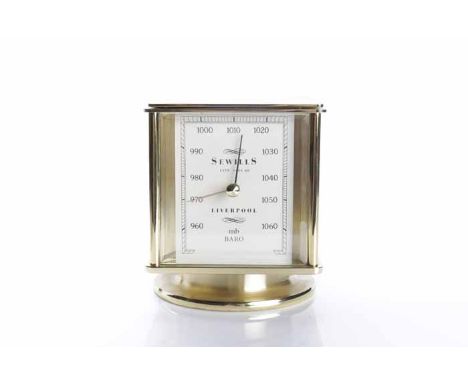 GILT METAL FOUR SIDED SEWILLS `WEATHER STATION` DESK CLOCK
quartz movement, the four signed dials displaying time, hygrometer