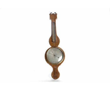 NINETEENTH CENTURY MAHOGANY WHEEL BAROMETER
the 8 inch silvered dial signed "A. Swan, Edinburgh", gilt and steel hands, with 