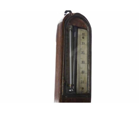 LATE NINETEENTH CENTURY STICK BAROMETER
the arched display with ivory indicator and thermometer, 97cm high