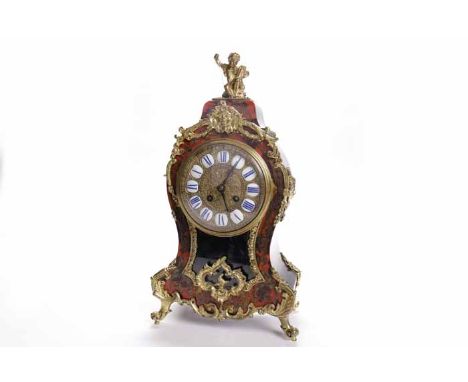 NINETEENTH CENTURY FRENCH ORMOLU BOULLE MANTEL CLOCK
the signed Samuel Marti two train movement striking on a gong and number