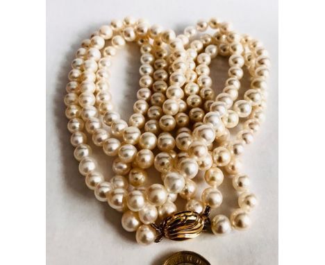 CULTURED PEARL THREE STRAND NECKLACE HAVING 9ct GOLD CLASP 
