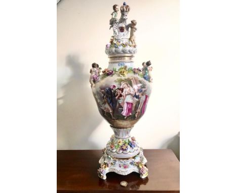 IMPRESSIVE CONTINENTAL CERAMIC URN-FORM VASE AND COVER UPON A SEPARATE RAISED STAND, APPROXIMATELY 59cm HIGH 