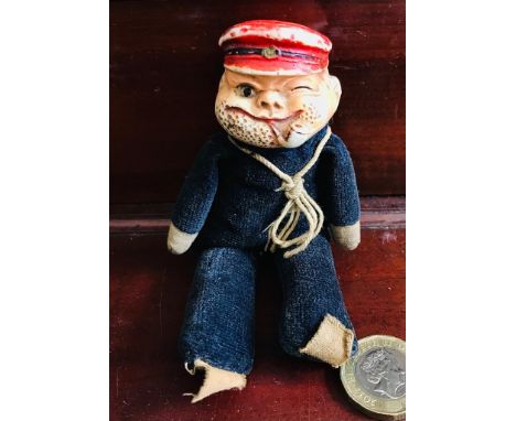 JAPANESE REPRESENTATION OF POPEYE THE SAILOR MAN, CIRCA 1930, CERAMIC HEAD, APPROXIMATELY 13.5cm LONG 