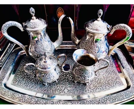 GOOD QUALITY INDIAN SILVER COLOURED METAL UNHALLMARKED TEA SET COMPRISING OF TRAY, TEAPOT, JUG, CREAMER, SUCRIER AND COVER, W