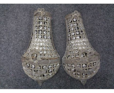 A pair of early twentieth century cast metal and beaded glass light fittings 