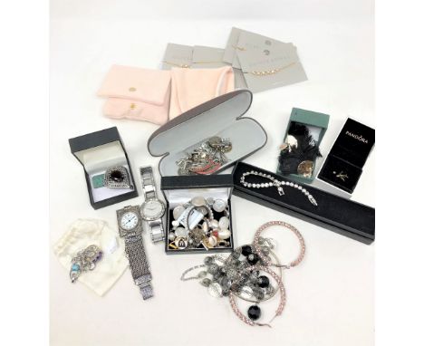 A quantity of jewellery items to include - two large hoop earrings and bangle, quartz wrist watch, DKNY wrist watch, faux pea