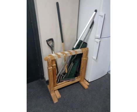A pair of pine trestle stands together with a small quantity of garden tools, folding chair in carry bag.  