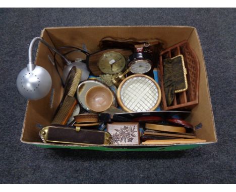 A box of miscellania to include mid 20th century mantel clock, hardwood letter rack, dressing table brushes, trinket boxes, w