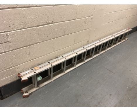 A two-section aluminium extension ladder. 