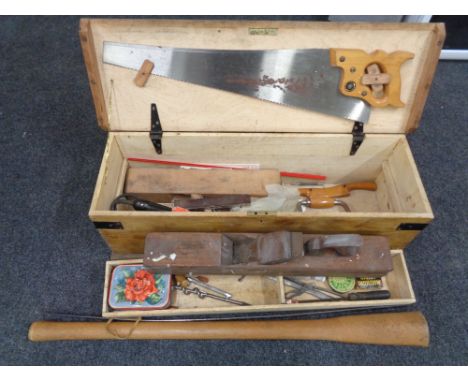 A joiner's tool box containing small quantity of hand tools, wood block planes, metal rule, pick axe handle etc 