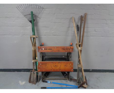 A folding Black and Decker work bench together with a quantity of assorted garden tools.  