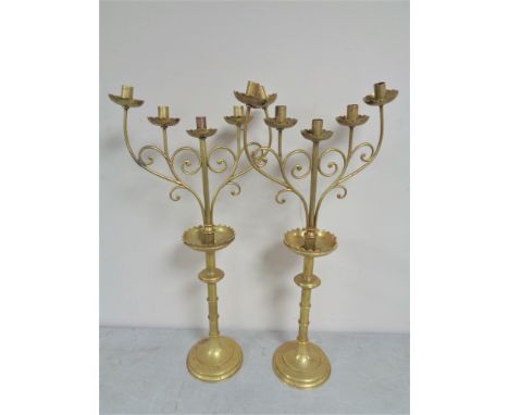 A pair of decorative brass five way candelabra, height 71.5 cm.    