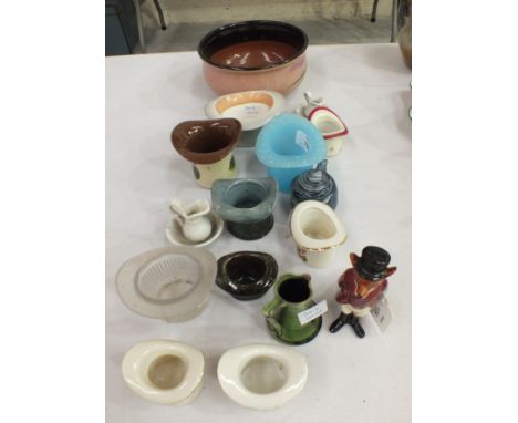 A collection of novelty ceramic and glass top hats, a Royal Doulton model of a fox in hunting attire and other ceramics.