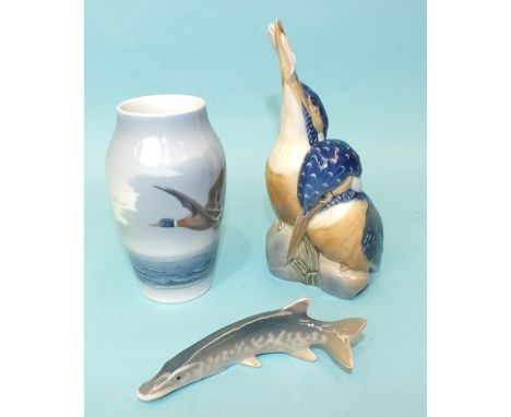 A Royal Copenhagen figure group of two kingfishers, one with a fish in its beak, numbered 1769, 18cm high, a model of a pike,