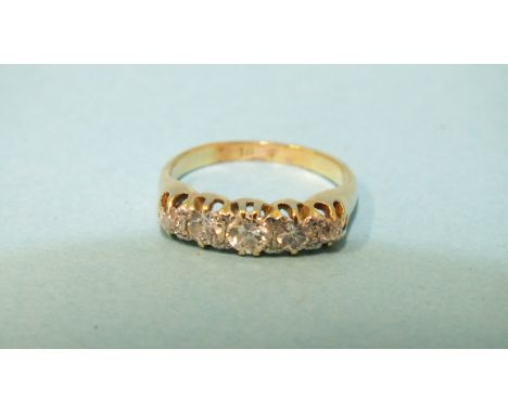 An 18ct gold ring set five graduated old brilliant cut diamonds, total diamond weight approx 0.6cts, size l, 3.8g.