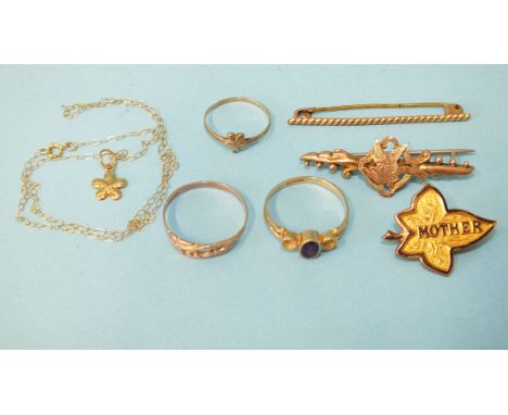 A small 9ct gold daisy pendant set diamond point, on chain, a matching ring, two other 9ct gold rings and three 9ct gold broo