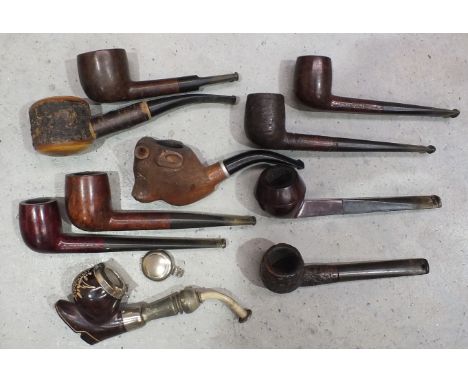 Masonic interest: A carved wood pipe in the form of a buffalo (horns lacking) marked 'RAOB' and nine other English and Contin