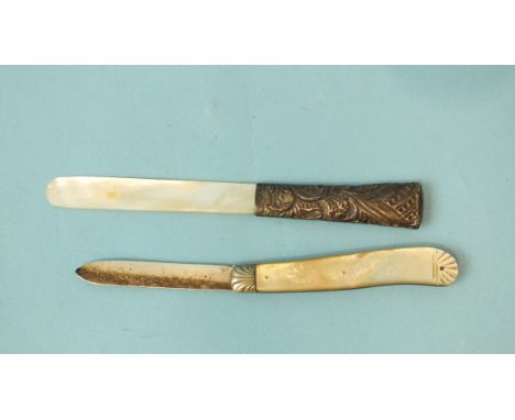 A mother of pearl handled silver bladed fruit knife with blank cartouche and engraved decoration to handle, 14cm open, Sheffi