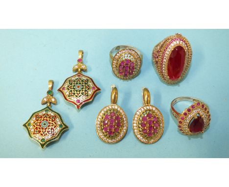 A collection of stone set silver gilt jewellery, comprising: a synthetic ruby and white stone cluster ring and matching earri