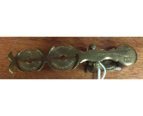 A set of sovereign and half-sovereign scales, stamped Harrison.