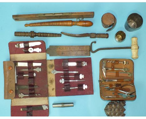 Two travelling tool kits in leather pouches, a Rabone wooden rule and other items.