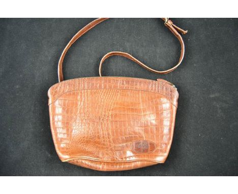 A vintage Mulberry chestnut brown congo leather shoulder bag, zip fastening to top, tartan lining with internal zipped pocket