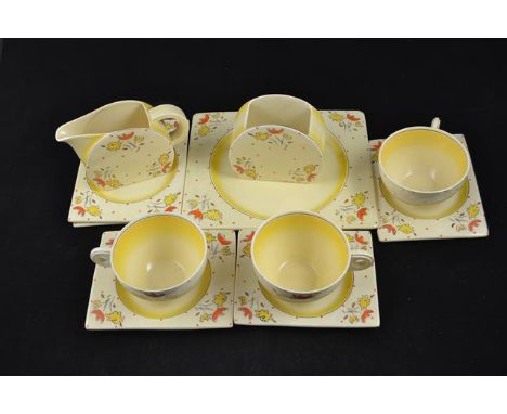 Clarice Cliff Bizzare Bon Jour shape tea ware comprising milk jug, sugar basin, Biarritz bread and butter plate, six Biarritz