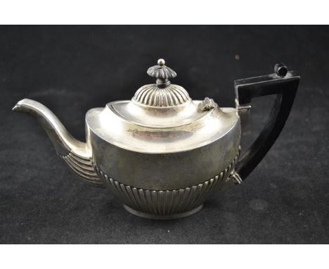 A silver batchelor's teapot of half fluted design and wooden handle, Birmingham 1901, maker Elkington & Co - approx gross wei