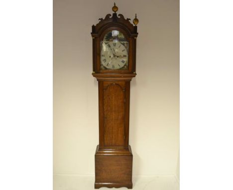 A late 18th/early 19th century oak longcase clock, arched painted dial with date aperture, eight day movement, two lead weigh
