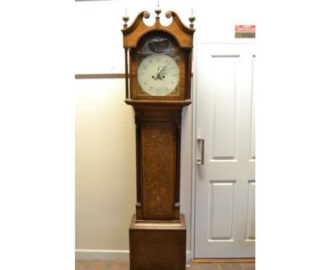 An early 19th Century oak longcase clock, painted arched dial, eight day movement, case with side columns with brass capitals