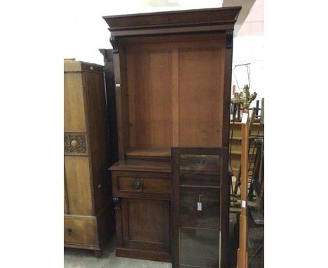 A mid 19thc bureau bookcase, the moulded cornice above two glazed doors, and adjustable shelves, fitted single pull out friez