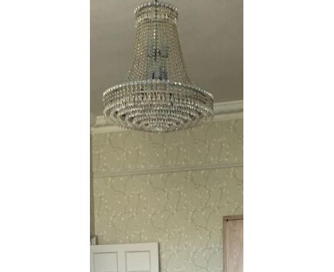 An impressive modern three tier stepped chandelier, metal painted eggshell blue, complete with multiple faceted drops (from r