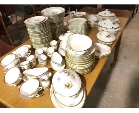 An extensive mid century Royal Copenhagen dinner service in Brown Rose pattern, complete with dinner plates, side plates, sou