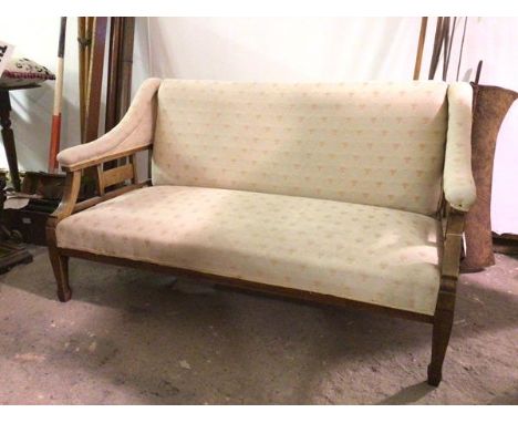 A late 19thc/early 20thc mahogany frame sofa with later upholstery, on tapering front supports terminating in spade feet (78c