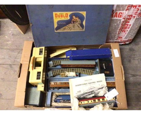 A Hornby Dublo electric train set complete with rolling stock, carriages, Sir Nigel Gresley model engine, transformer, rails,