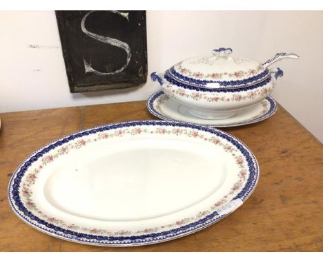 A 19thc tureen (18cm x 35cm x 22cm) with matching plate and ashet and unassociated china ladle (4)