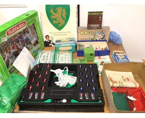 A Subbuteo game together with accessories including ball boys and additional players, a St Andrews Golf course golf game, a N