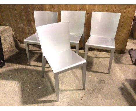 A set of four Molteni &amp; Co. side chairs, model UPGF30 (each: 79cm x 40cm x 52cm)