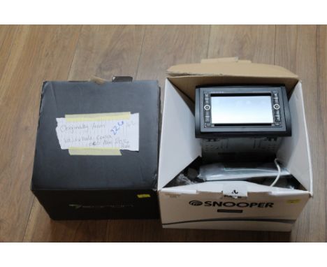Snooper Model AVNS 9000 in car entertainment system and Delphi CD media unit, originally from a Vauxhall Corsa 