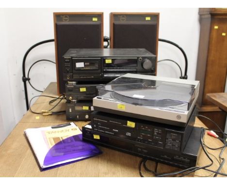 Stacking music system with Technics CD player, amplifier, radio cassette player and turntable, Philips CD player and Denon mu