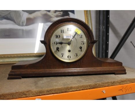 Chiming wooden mantle clock with key, 57 cm x 28 cm
