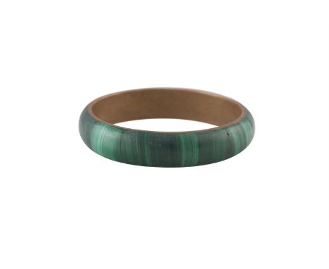 TWO BANGLE BRACELETSOne bangle mounted in yellow metal and malachite, the other bangle mounted as a colourless and green hard