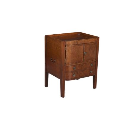 A GEORGE IV MAHOGANY BOWFRONT COMMODE, the tray top above twin panel drawer in a two drawer pull out fascia pot drawer, on br