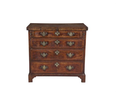 A GEORGE II INLAID WALNUT FOLDING TOP SECRETAIRE CHEST, the fitted interior raised on a chest of four long graduated drawers 