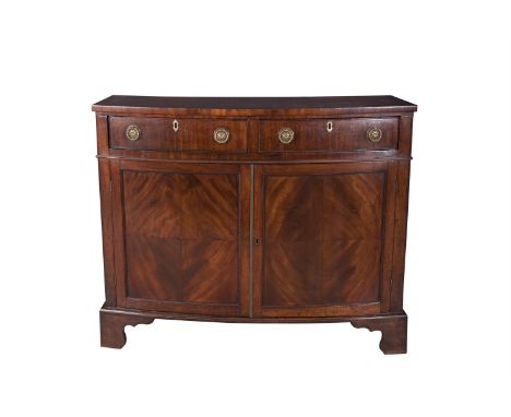A GEORGE III INLAID MAHOGANY BOWFRONT SIDE CABINET, the crossbanded top above twin frieze drawers with ring handles, above tw