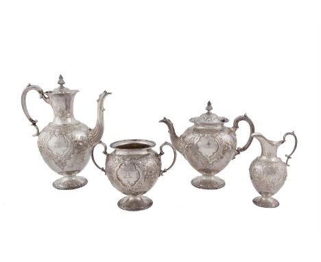 A VICTORIAN FOUR PIECE SILVER TEA AND COFFEE SERVICE, Sheffield 1864, maker's mark of Martin Hall & Co., comprising coffee po